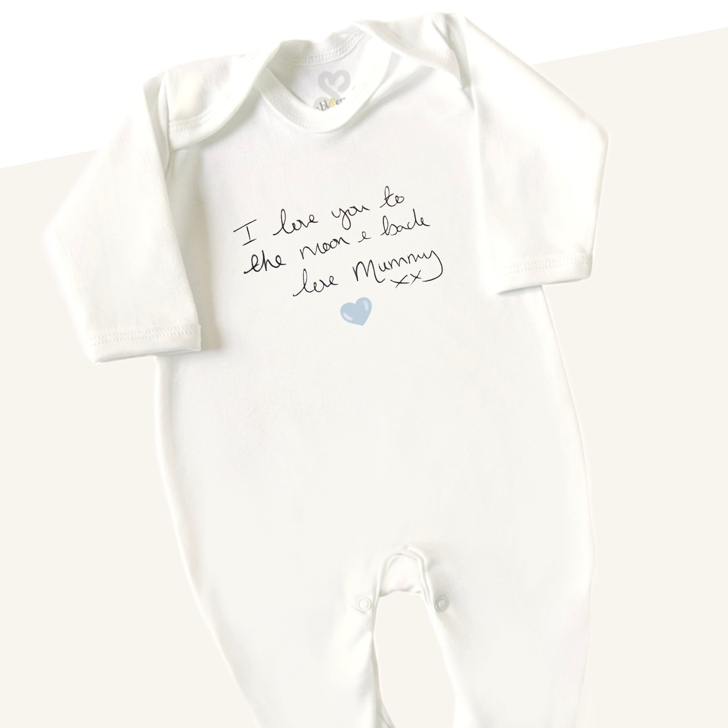 babygrow with handwritten message printed on