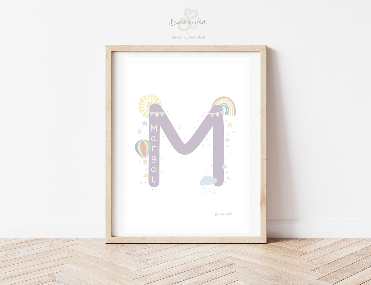 personalised girls bedroom letter and name print in purple and pastel tones with rainbows and hot air balloons