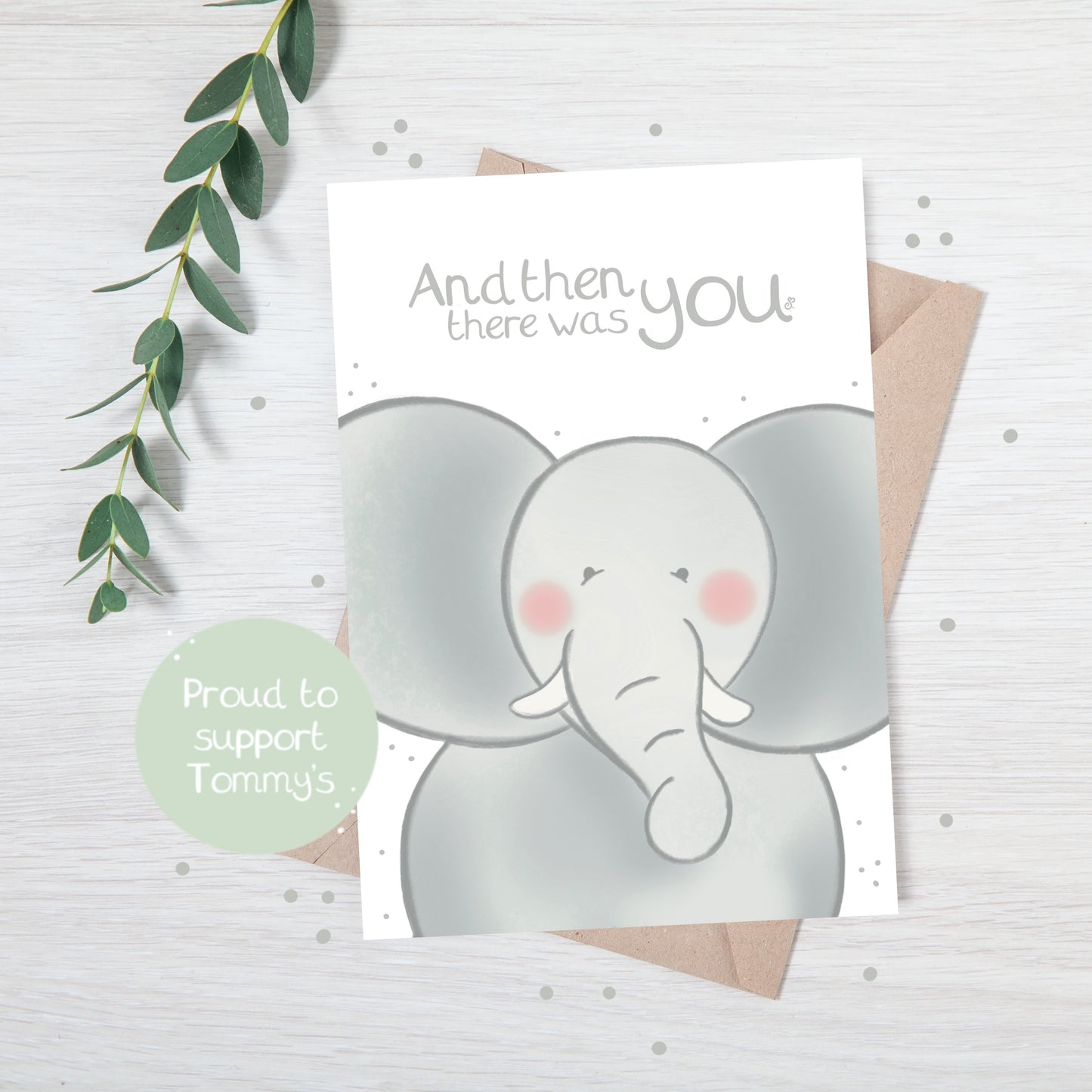 Handmade luxury new baby shower card with a safari theme baby elephant popping up from the bottom with the title &quote "and then there was you" on a white background, with a kraft envelope