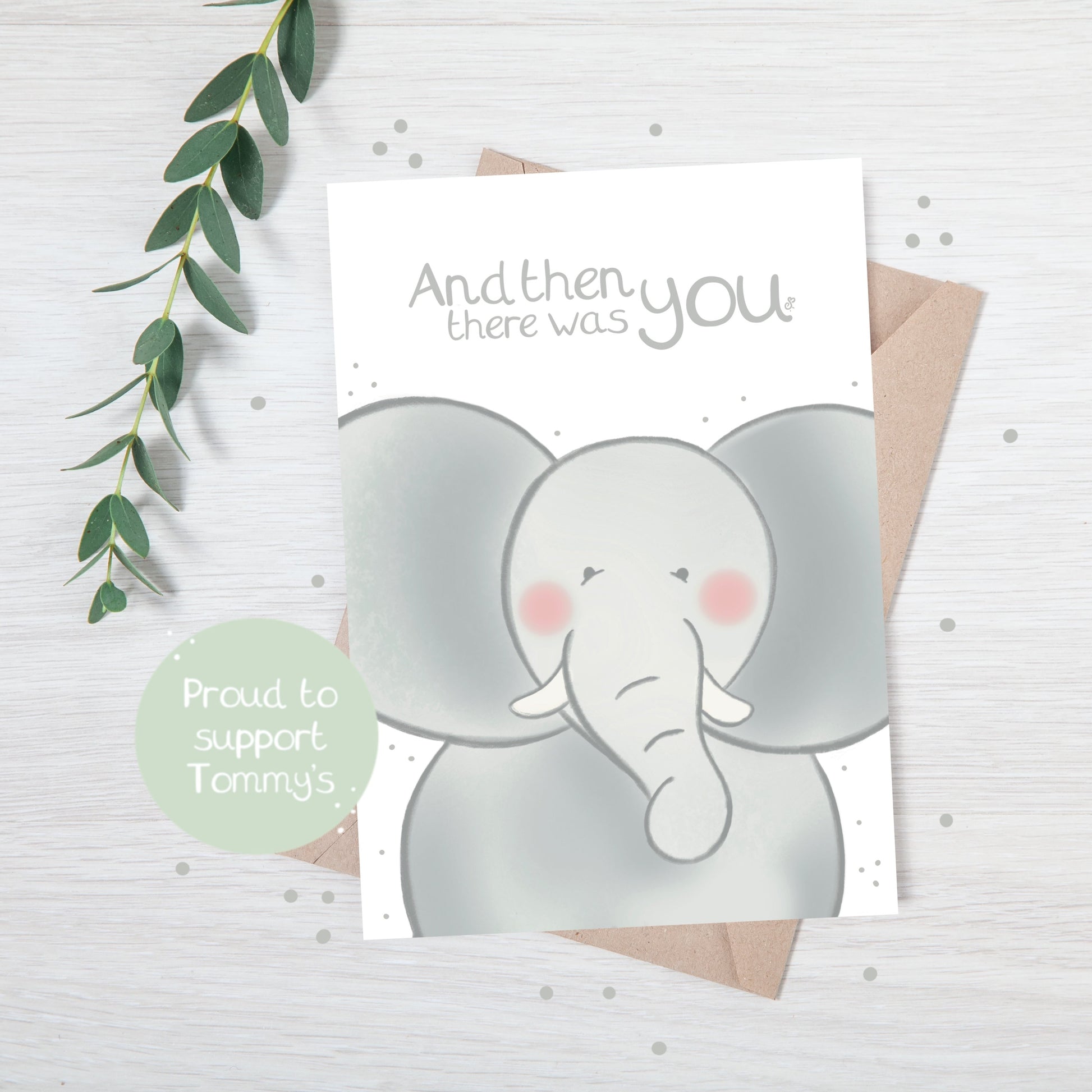 Handmade luxury new baby shower card with a safari theme baby elephant popping up from the bottom with the title &quote "and then there was you" on a white background, with a kraft envelope