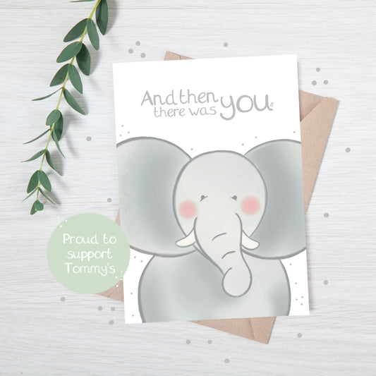 Handmade luxury new baby shower card with a safari theme baby elephant popping up from the bottom with the title &quote "and then there was you" on a white background, with a kraft envelope