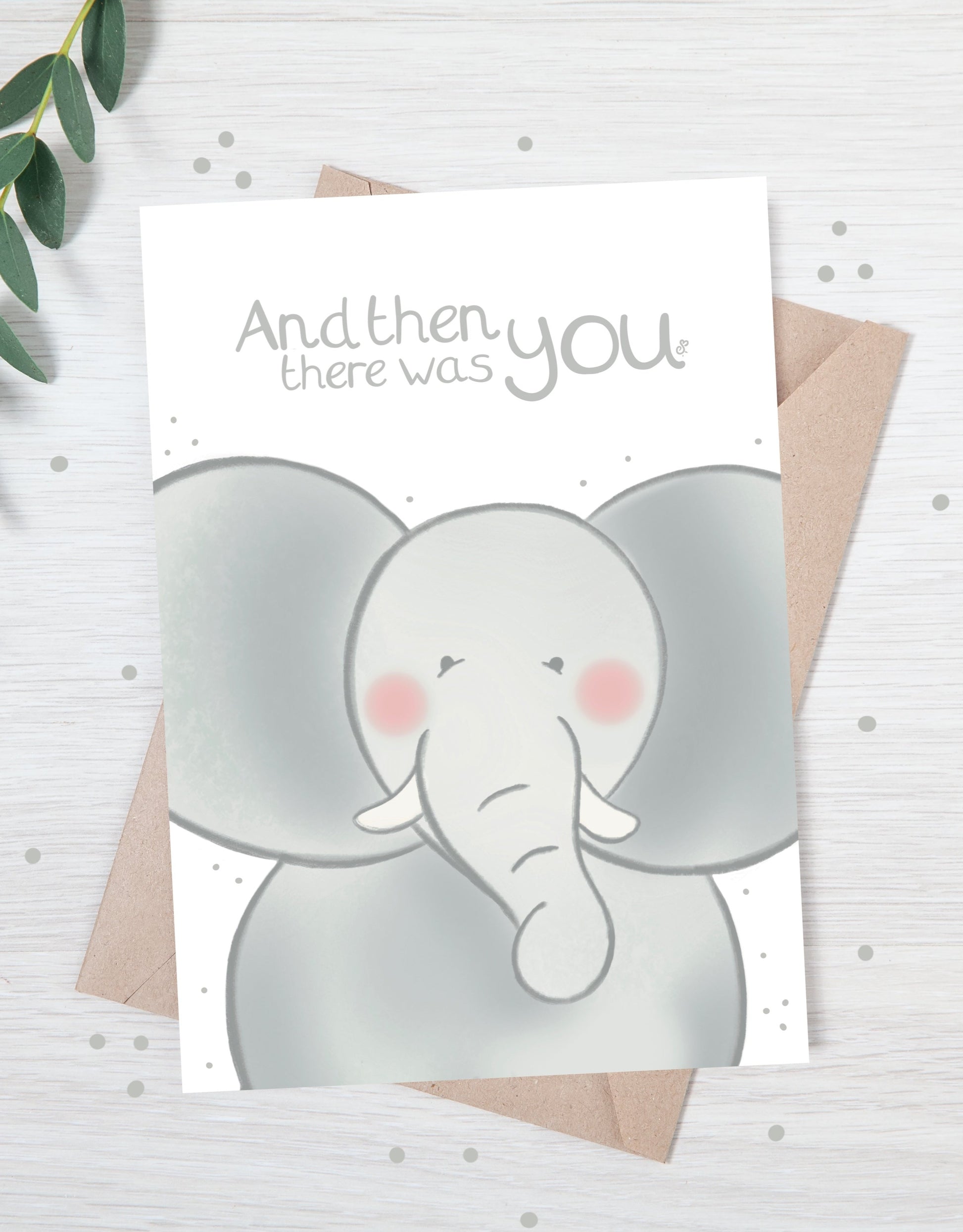 Handmade luxury new baby shower card with a safari theme baby elephant popping up from the bottom with the title &quote "and then there was you" on a white background, with a kraft envelope