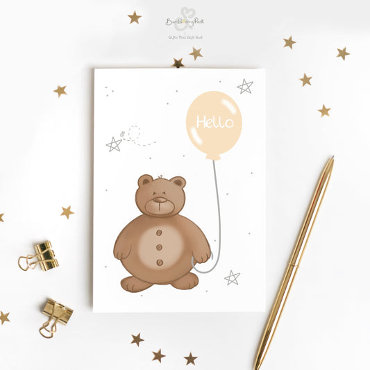 new baby unisex card with teddy bear holding a balloon with "hello" gift message