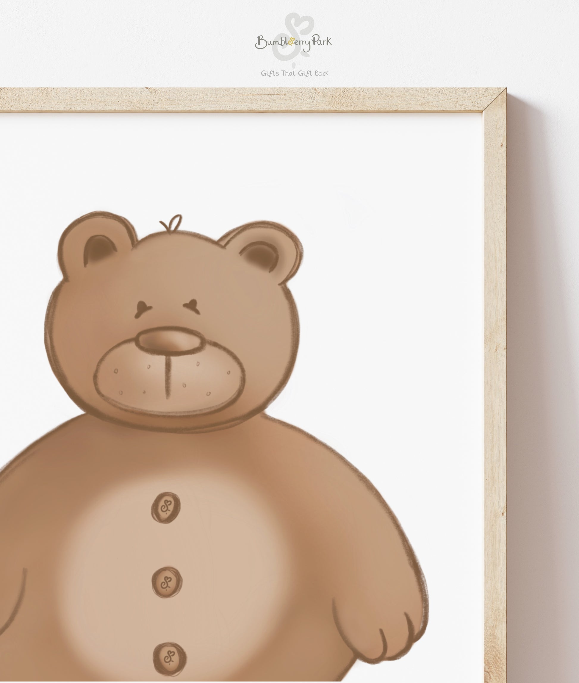 close up on framed art print of bumbleberry brown teddy bear nursery print