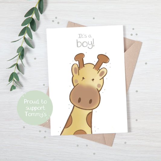 Handmade luxury new baby christening greetings card with a safari theme baby giraffe popping up from the bottom with the title &quote "it's a boy" on a white background, with a kraft envelope