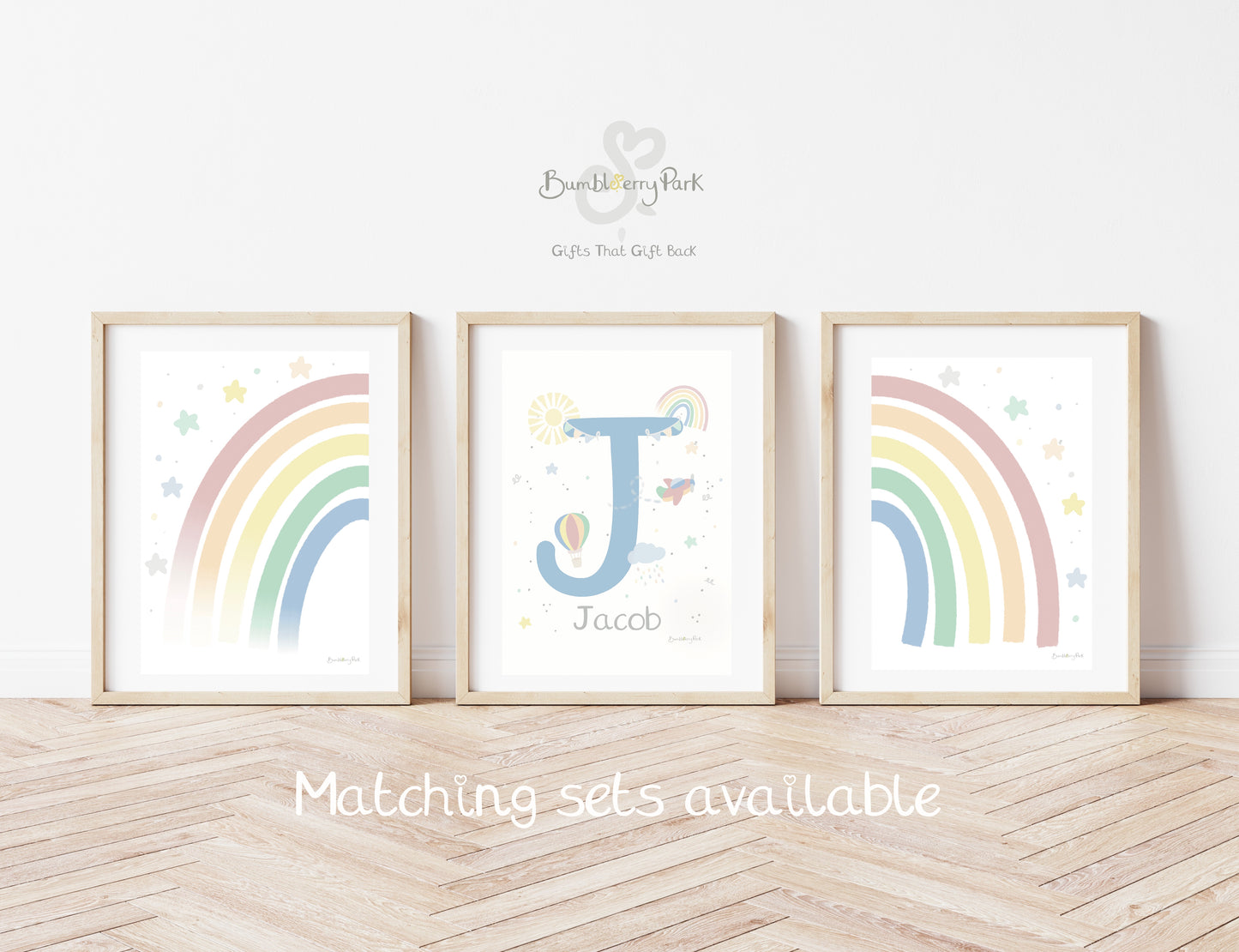 set of three rainbow and initial prints for a children's bedroom or baby's nursery with sunshine, clouds and hot air balloon decals