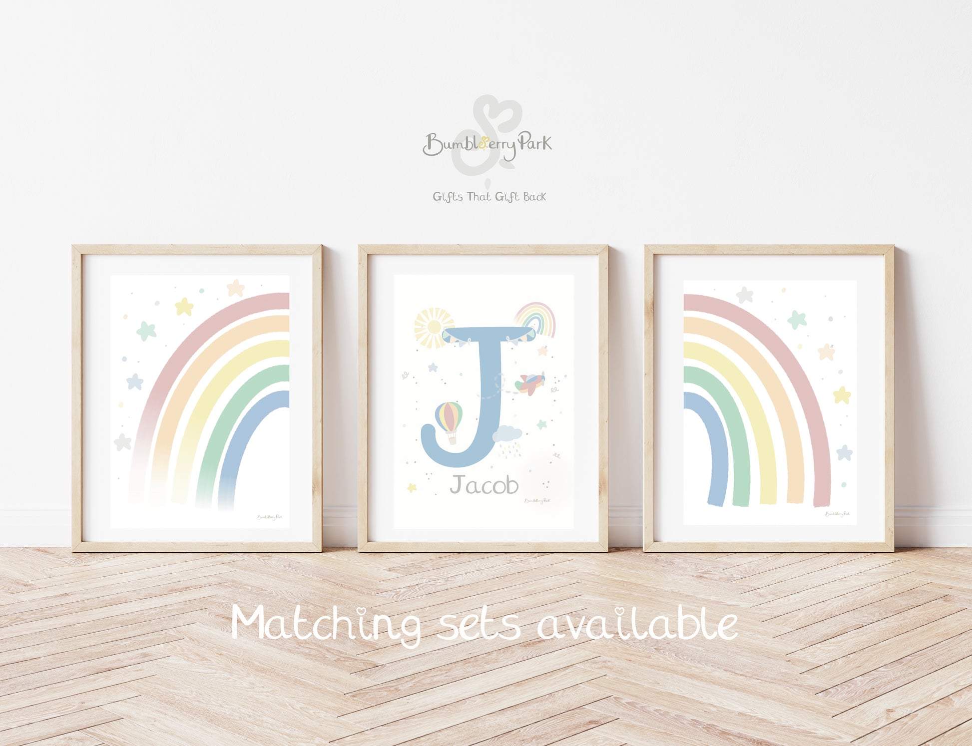 set of three rainbow and initial prints for a children's bedroom or baby's nursery with sunshine, clouds and hot air balloon decals