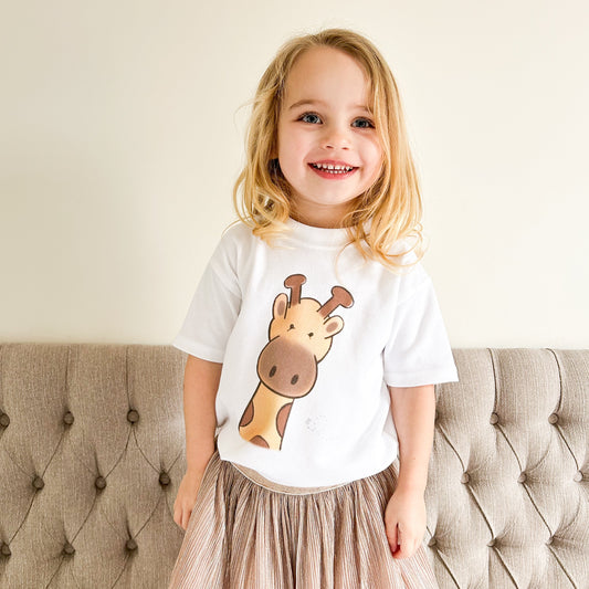 toddler girl wearing safari animal giraffe t-shirt and pink tutu skirt