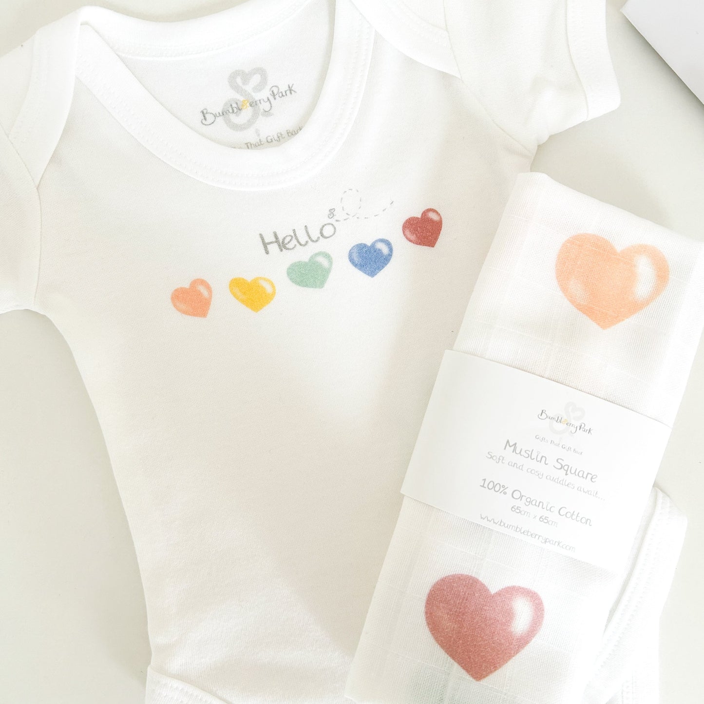 love heart printed baby vest with matching colourful heart printed muslin baby gift set