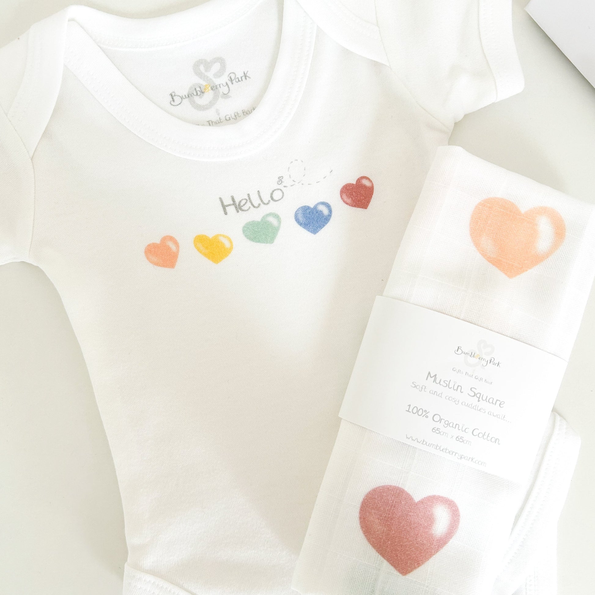 love heart printed baby vest with matching colourful heart printed muslin baby gift set