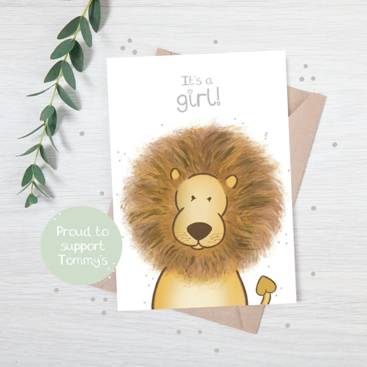 Handmade luxury new baby christening greetings card with a safari theme baby Lion popping up from the bottom with the title &quote "it's a girl" on a white background, with a kraft envelope