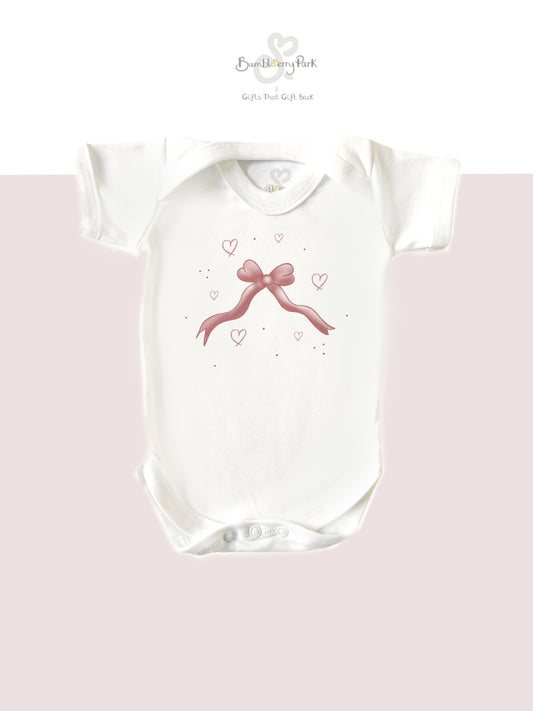 baby girls pink ow bodysuit