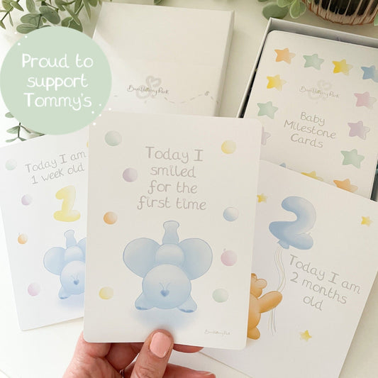 gift set of 22 baby milestone keepsake cards for memorable keepsake gift for new baby and baby shower. Pastel illustrations of baby animals and gift box set